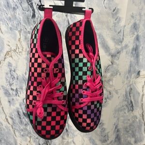 These are Checker bright  light shoes For young women /girls size 8